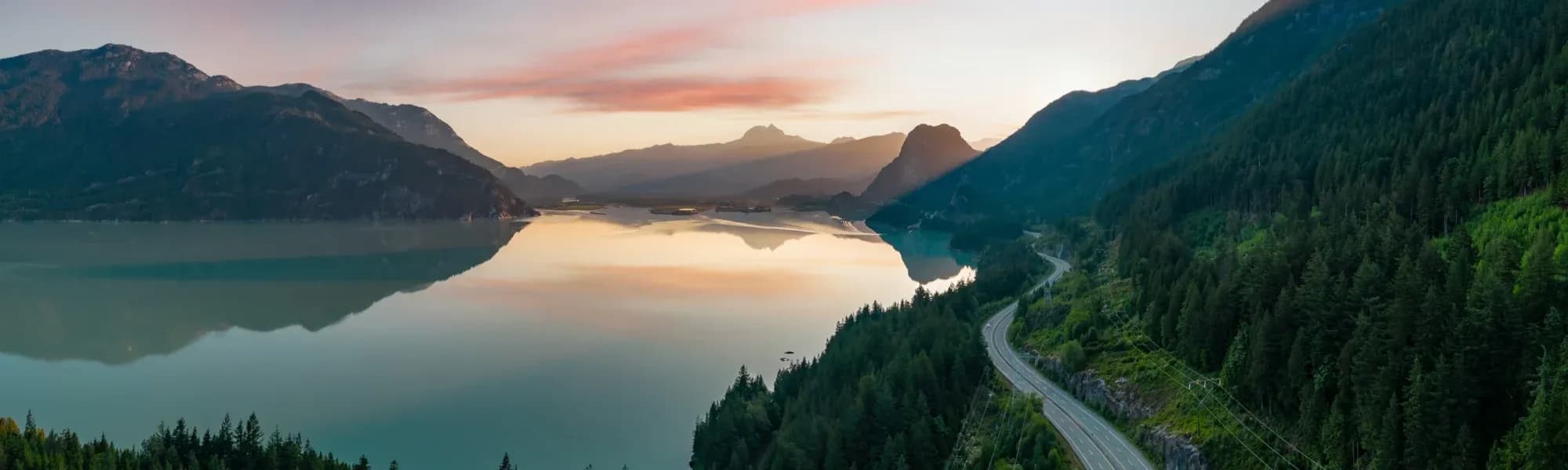 Picture of a road next to a fjord